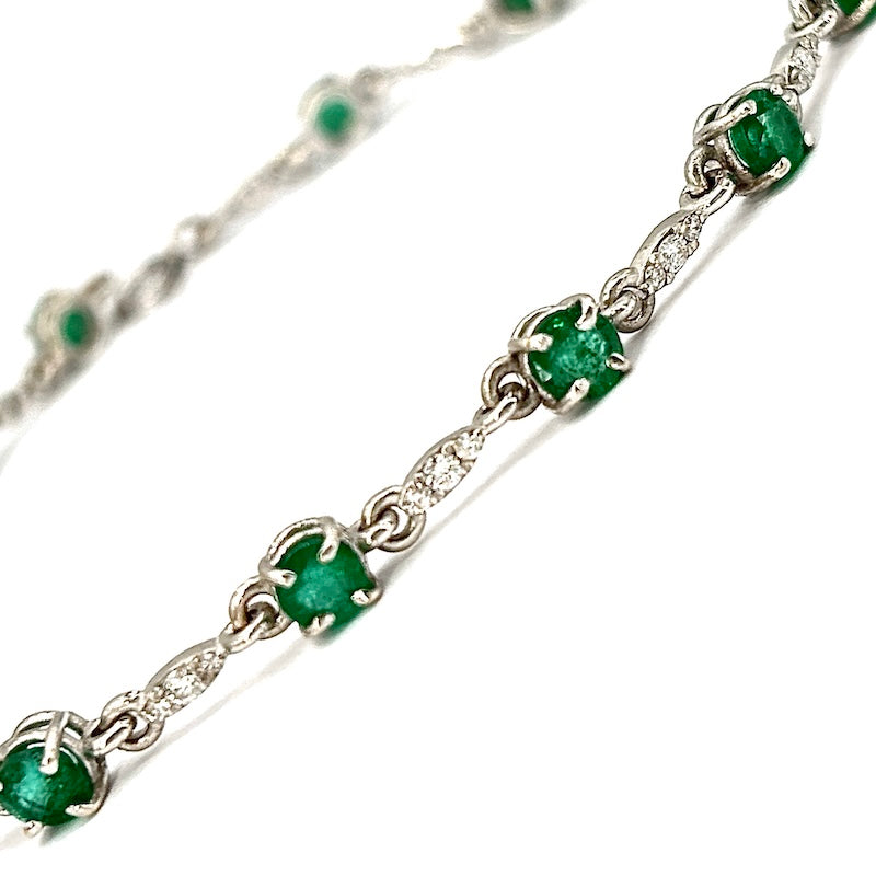 Bracciale smeraldi - 2.89 ct - brillanti - 0.56 ct - e oro; 5.67 gr