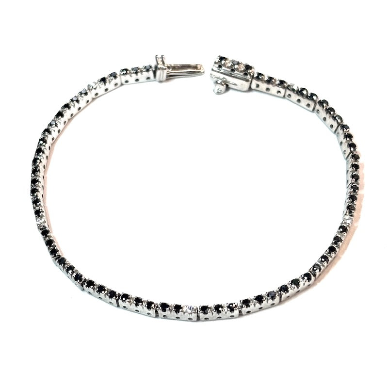 Bracciale tennis brillanti neri e bianchi, oro bianco; 7.7 gr - 15.3 cm