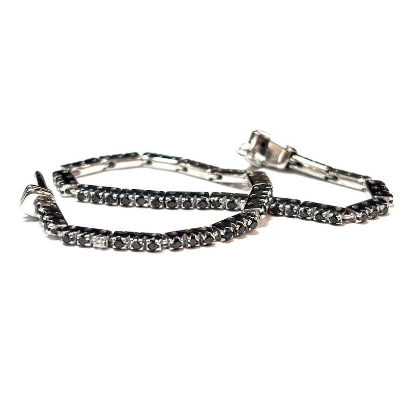 Bracciale tennis brillanti neri e bianchi, oro bianco; 7.7 gr - 15.3 cm