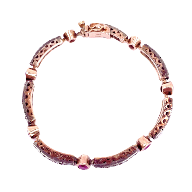 Bracciale tennis in stile antico, rubini e diamanti; 1-1.20 ct; 18 cm - 21.48 gr.