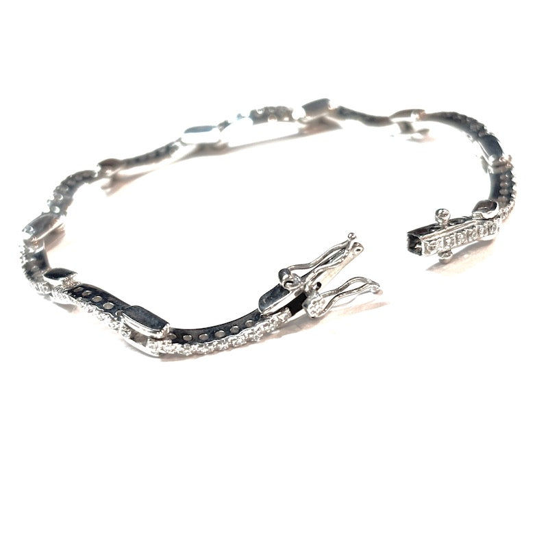 Bracciale tennis onde oro bianco e brillanti - 0.30-0.40 ct; 10.5 gr - 15.3 cm
