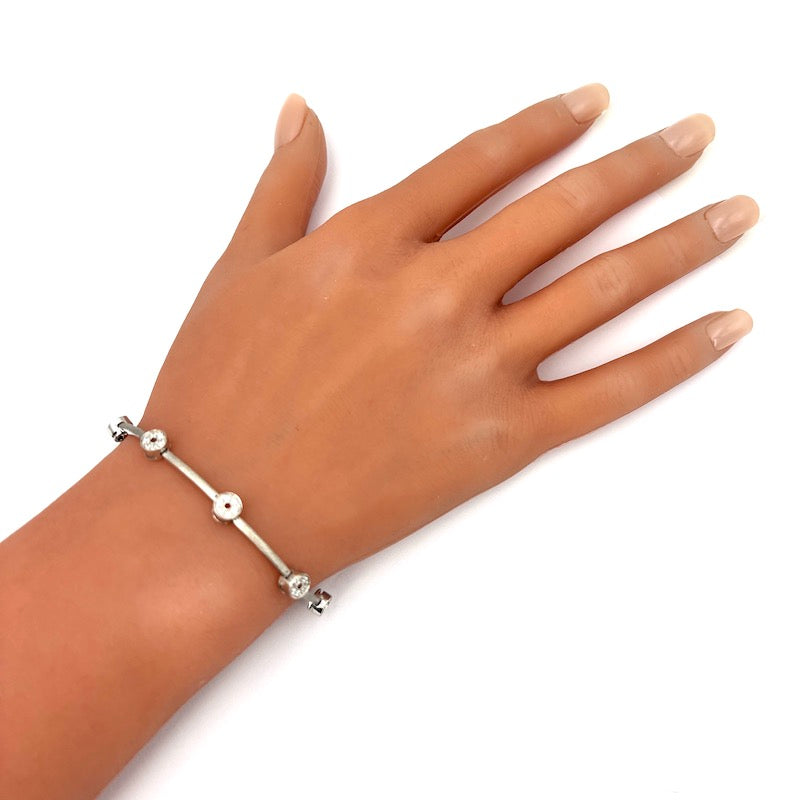 Bracciale tennis oro bianco e cerchietti zirconi; 12.22 gr - 18 cm