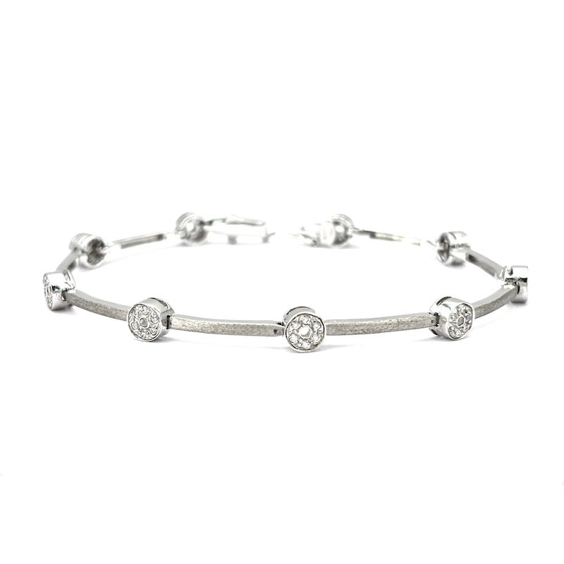 Bracciale tennis oro bianco e cerchietti zirconi; 12.22 gr - 18 cm