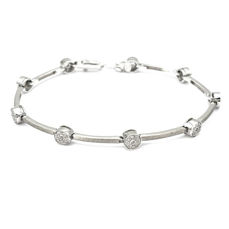 Bracciale tennis oro bianco e cerchietti zirconi; 12.22 gr - 18 cm