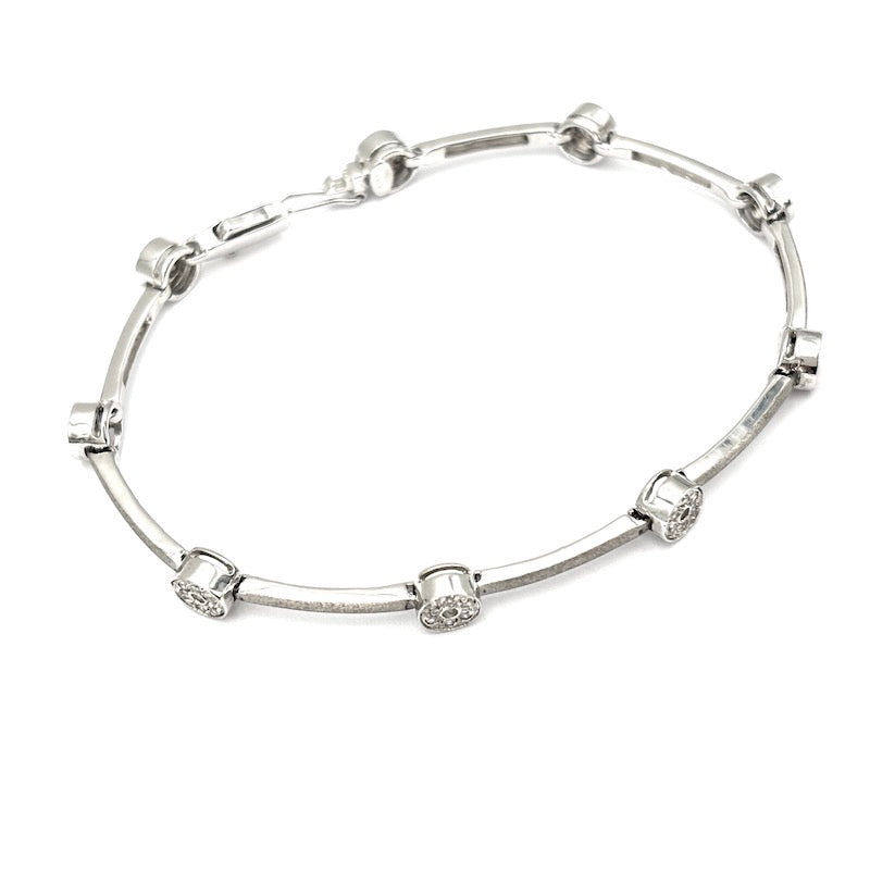 Bracciale tennis oro bianco e cerchietti zirconi; 12.22 gr - 18 cm