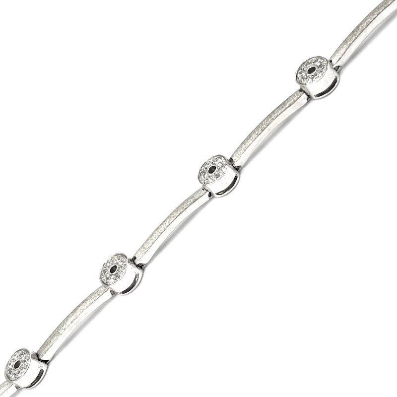 Bracciale tennis oro bianco e cerchietti zirconi; 12.22 gr - 18 cm