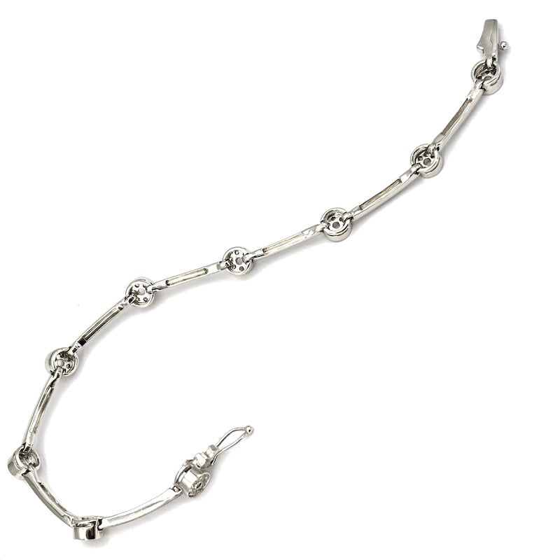 Bracciale tennis oro bianco e cerchietti zirconi; 12.22 gr - 18 cm