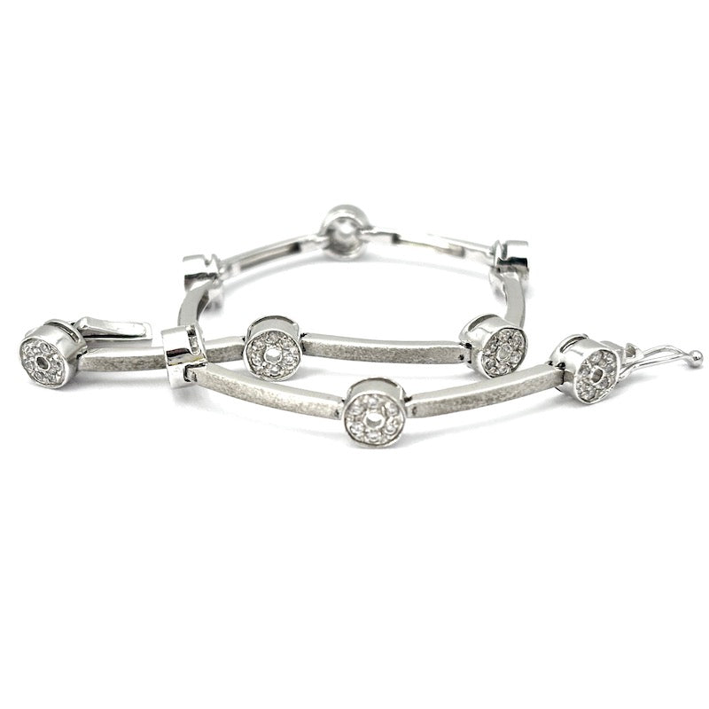 Bracciale tennis oro bianco e cerchietti zirconi; 12.22 gr - 18 cm