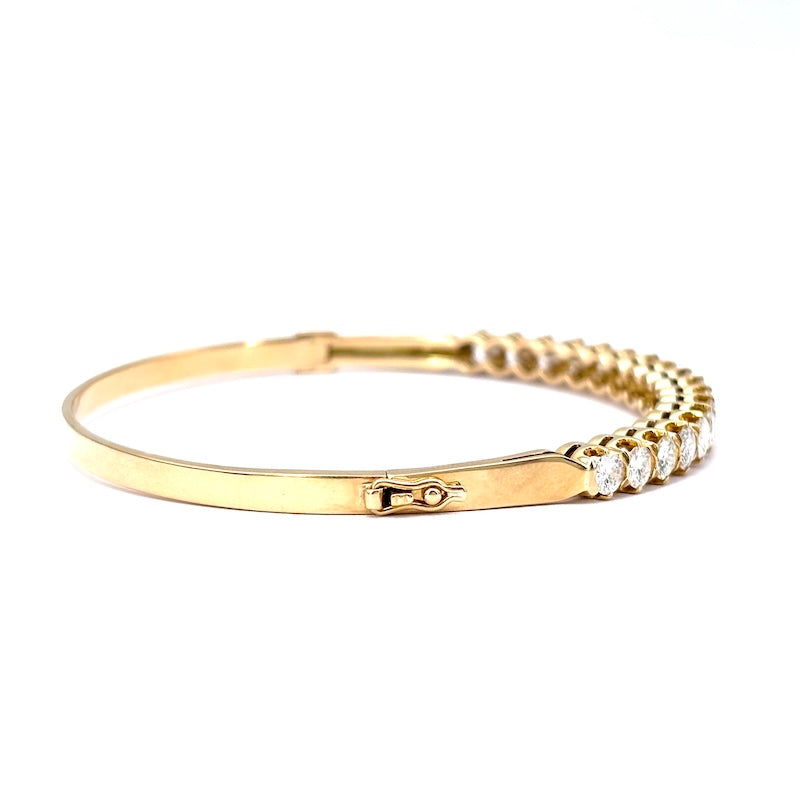 Bracciale tennis rigido oro giallo e brillanti; 16.6 gr