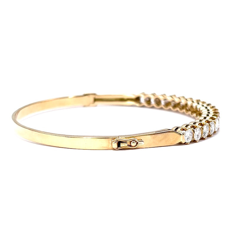 Bracciale tennis rigido oro giallo e brillanti; 16.6 gr