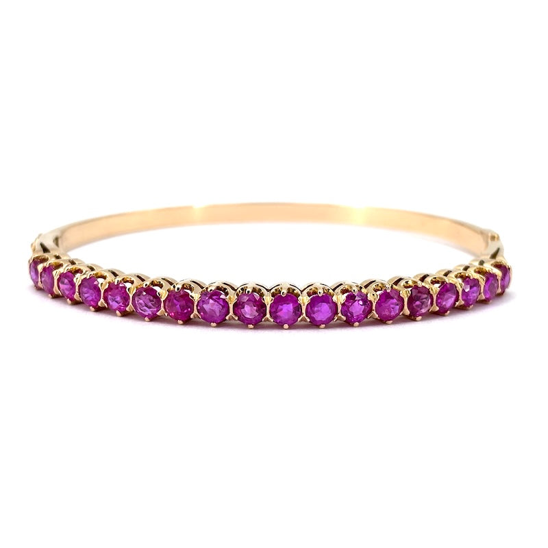 Bracciale tennis rigido oro giallo e rubini; 16.49 gr