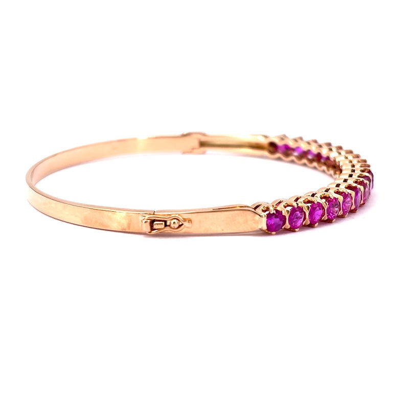 Bracciale tennis rigido oro giallo e rubini; 16.49 gr