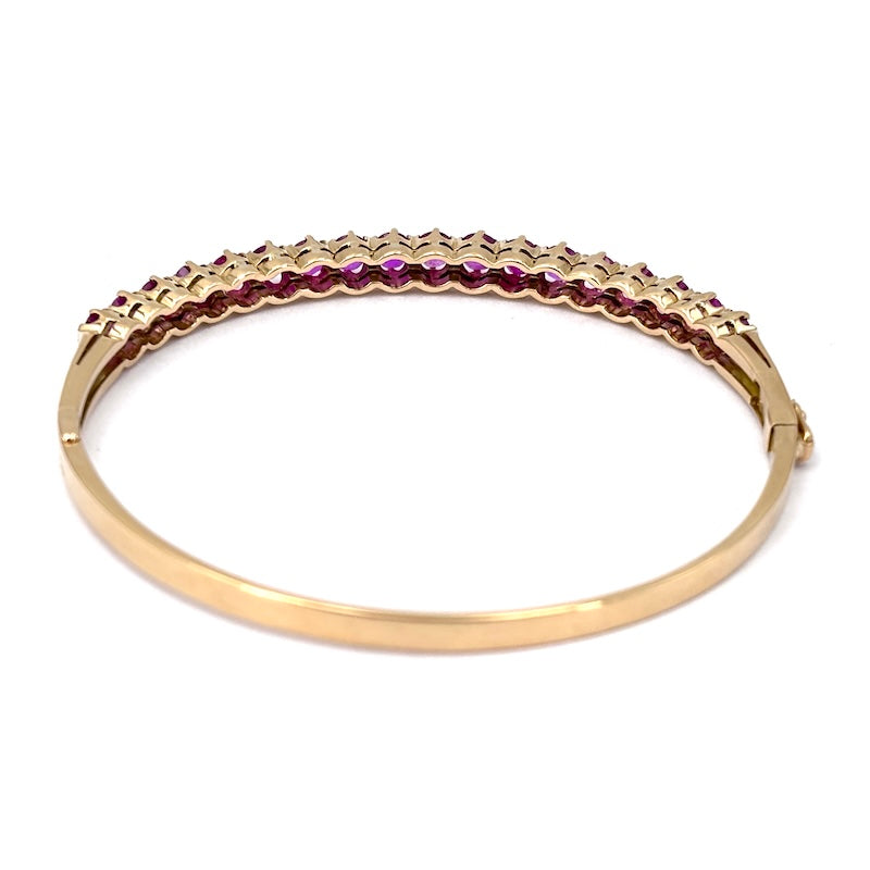 Bracciale tennis rigido oro giallo e rubini; 16.49 gr