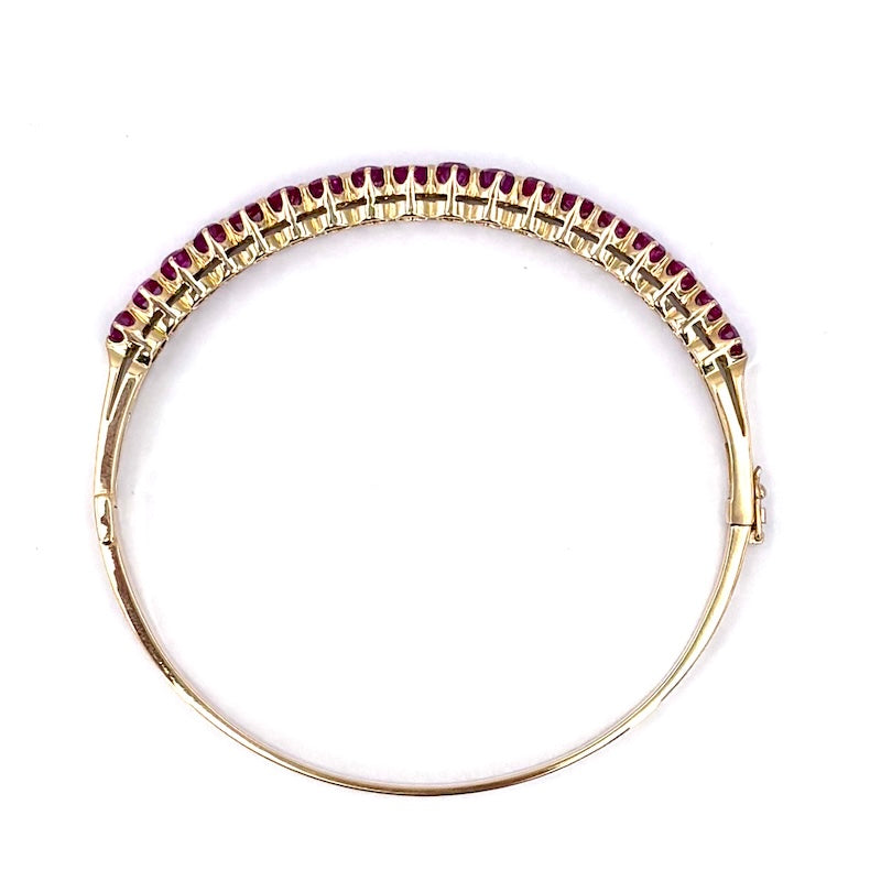 Bracciale tennis rigido oro giallo e rubini; 16.49 gr