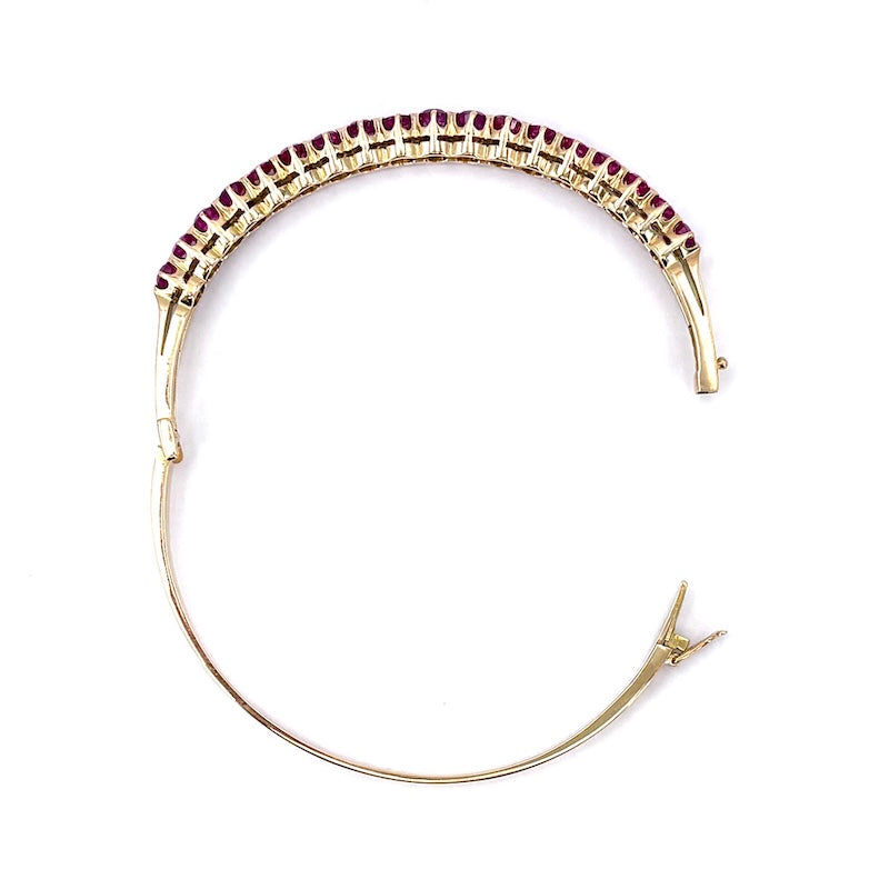 Bracciale tennis rigido oro giallo e rubini; 16.49 gr