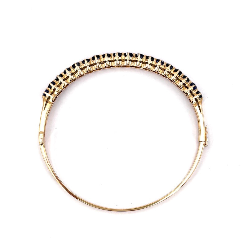 Bracciale tennis rigido oro giallo e zaffiri; 16.78 gr