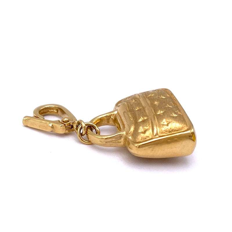 Ciondolo charm borsetta oro giallo 18 kt; 3.83 gr