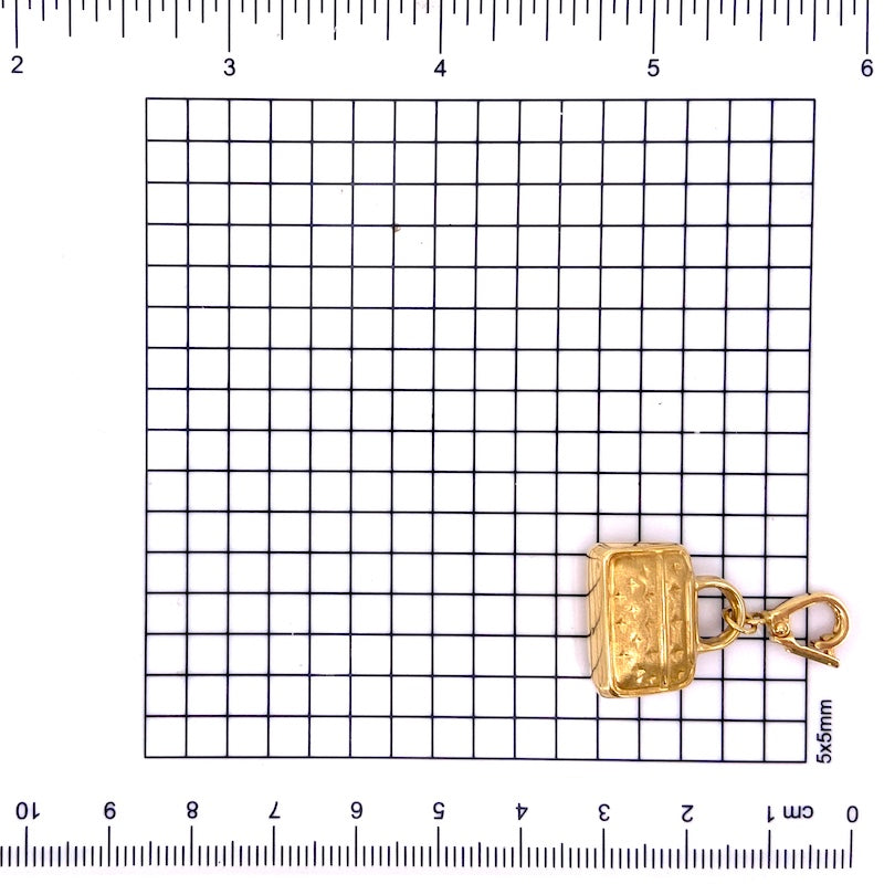 Ciondolo charm borsetta oro giallo 18 kt; 3.83 gr