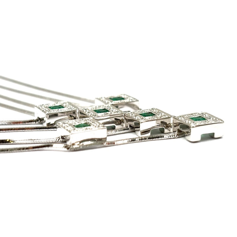 Ciondolo croce Salvini, mod. Amistad, smeraldi, brillanti e oro; 19.86 gr