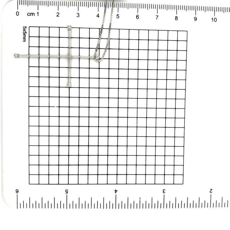 Ciondolo croce oro bianco e brillanti 0.06-0.08ct; 3.80 gr