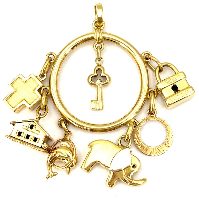 Ciondolo maxi vintage charms, oro giallo 18 kt; 23.1 gr