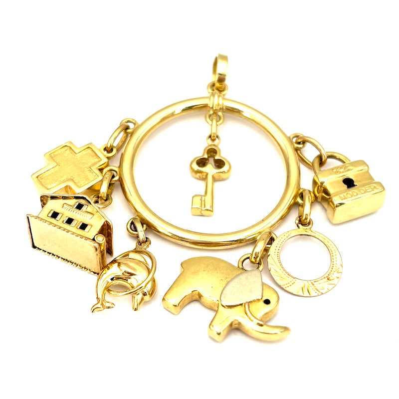 Ciondolo maxi vintage charms, oro giallo 18 kt; 23.1 gr