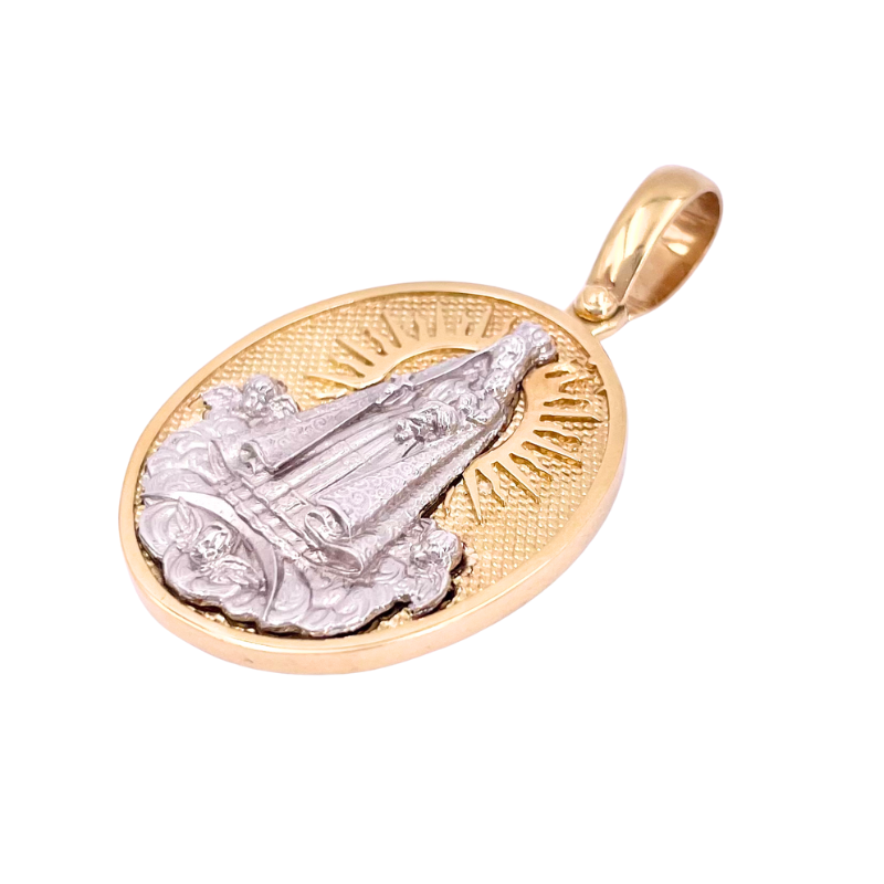 Ciondolo medaglia Madonna di Guadalupe, oro bicolore; 14.28 gr