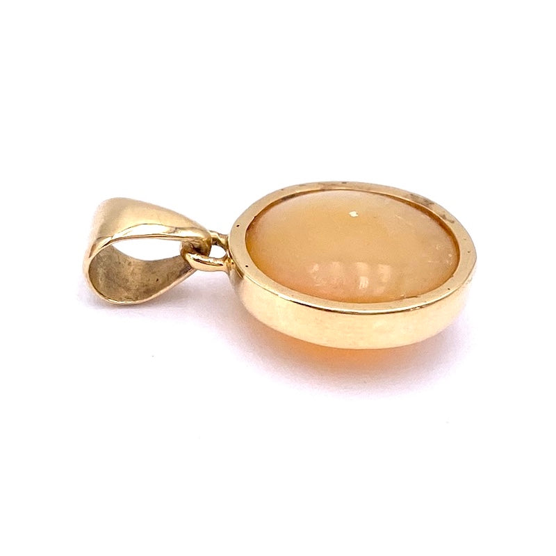 Ciondolo opale etiope e oro; 2.44 gr