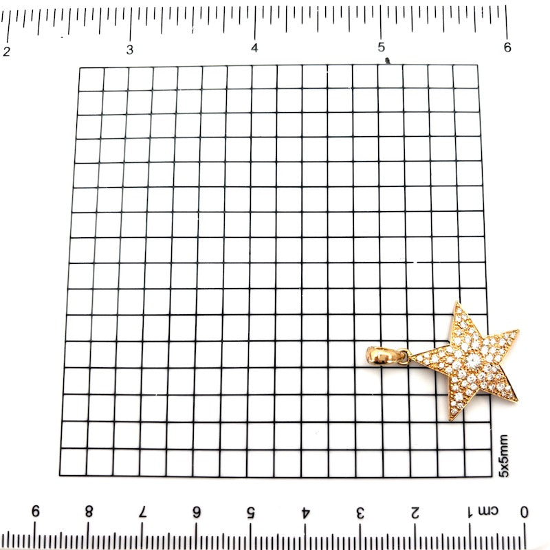 Ciondolo stella design, brillanti e oro giallo; 3.67 gr