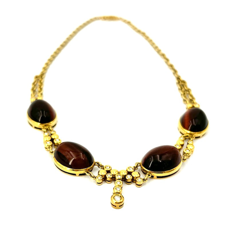 Collana/collier girocollo oro giallo, brillanti e gemme occhio di bue; 36.64 gr