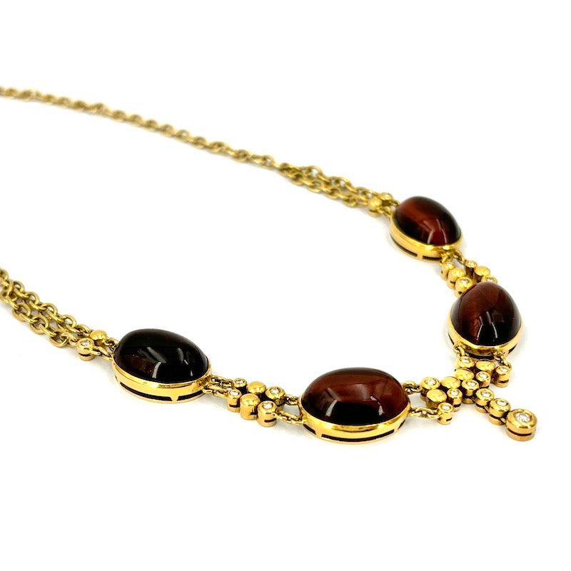 Collana/collier girocollo oro giallo, brillanti e gemme occhio di bue; 36.64 gr