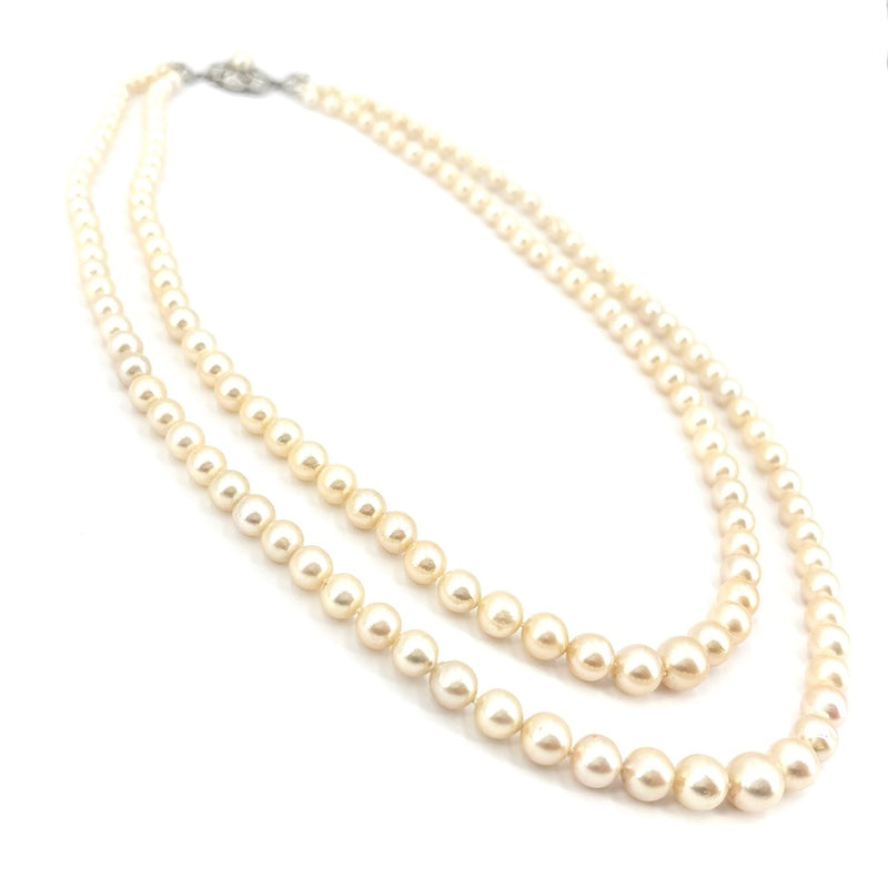 Collana doppio filo di perle, chiusura fiore in stile oro, perla e brillanti; 56.72 gr - 48 cm