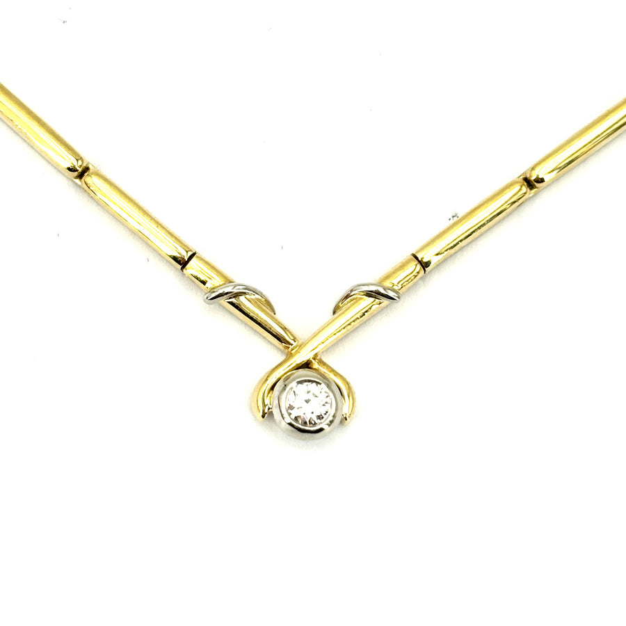 Collana girocollo Damiani oro con solitario; 21.26gr.