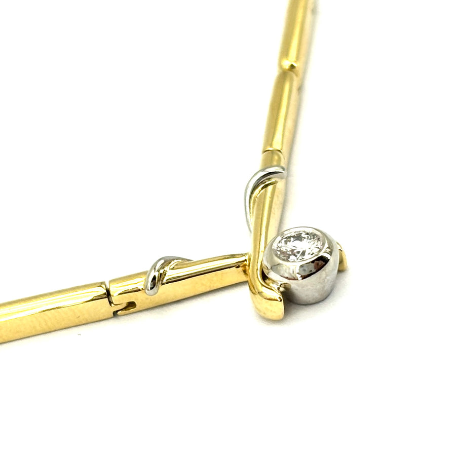 Collana girocollo Damiani oro con solitario; 21.26gr.