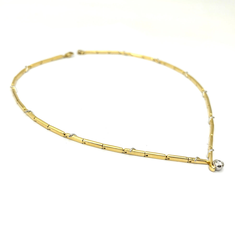 Collana girocollo Damiani oro con solitario; 21.26gr.