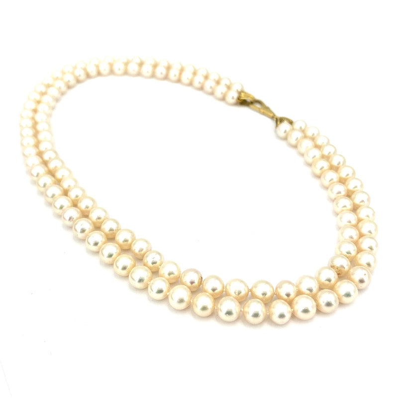 Collana perle doppia, chiusura e cappette in stile oro e brillanti; 85.53 gr - 48 cm