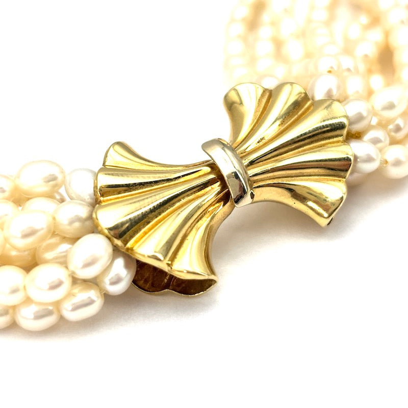 Collana torchon 9 fili microperle e fiocco oro - 54 cm; 128 gr