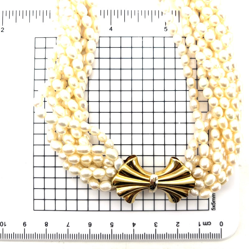 Collana torchon 9 fili microperle e fiocco oro - 54 cm; 128 gr