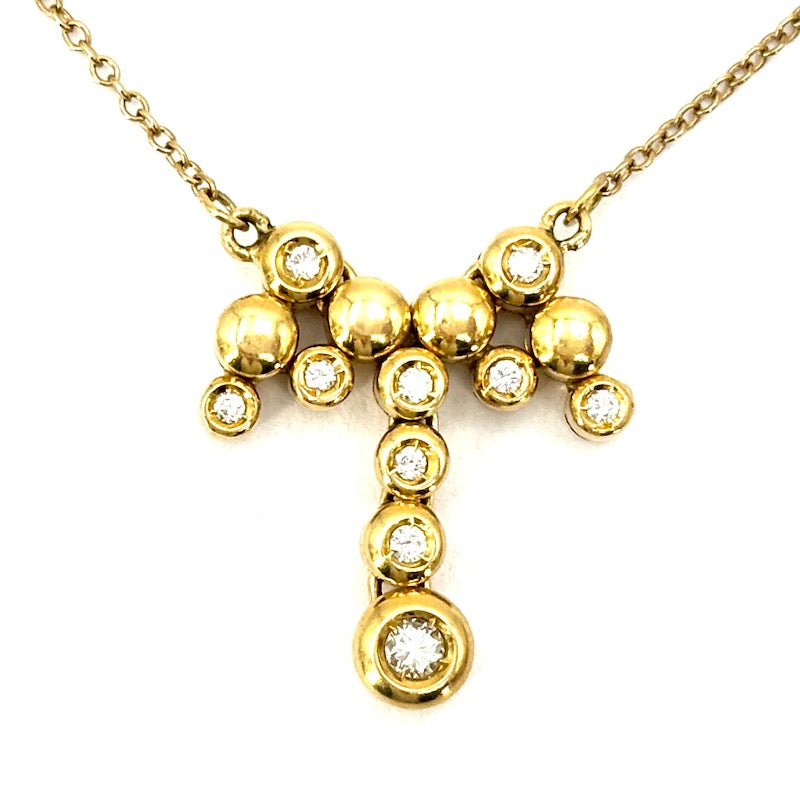 Collier girocollo con ciondolo fiocco oro giallo e brillanti; 5.44 gr
