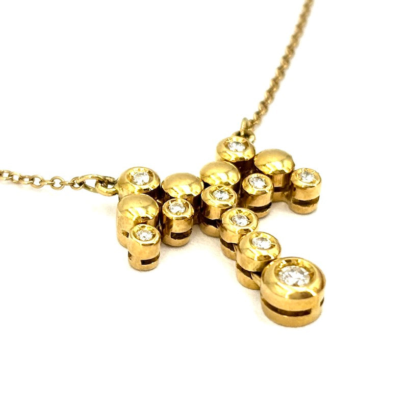 Collier girocollo con ciondolo fiocco oro giallo e brillanti; 5.44 gr