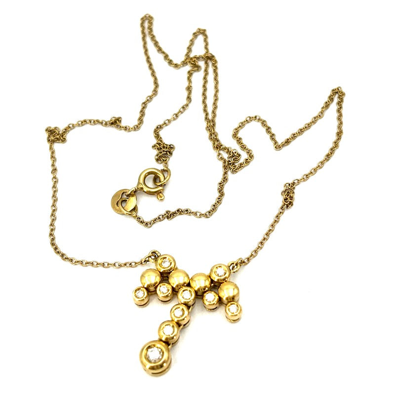 Collier girocollo con ciondolo fiocco oro giallo e brillanti; 5.44 gr