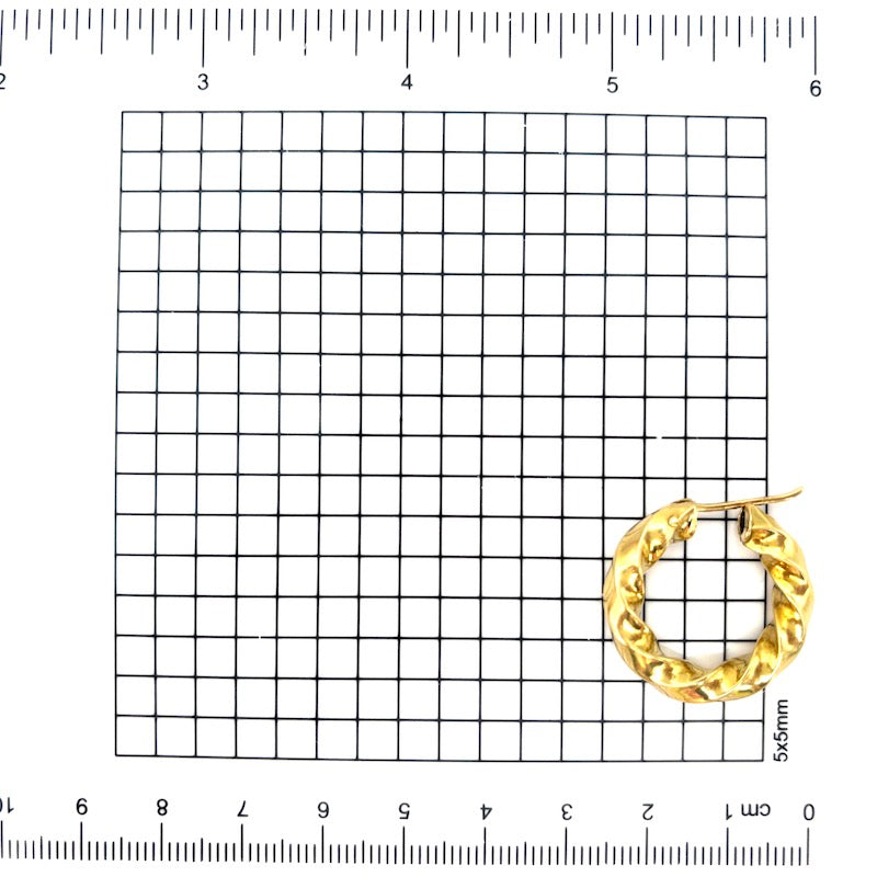 Orecchini anelle ritorte oro giallo; 6.65 gr - 2.5 cm