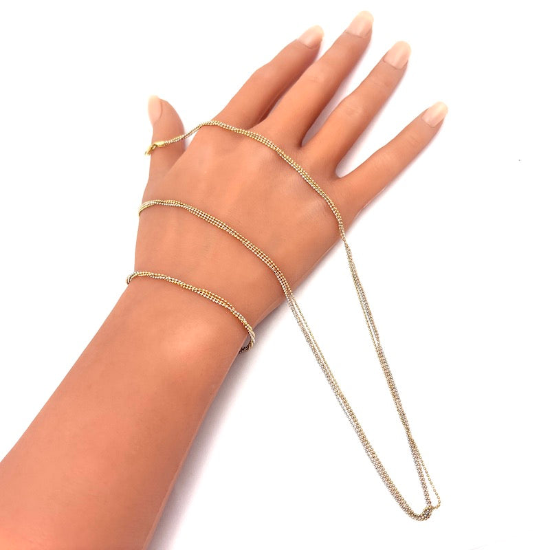 Parure stile mille fili oro tricolore, catene pallini; collana 44 cm + bracciale 19 cm - 8.41 gr totali