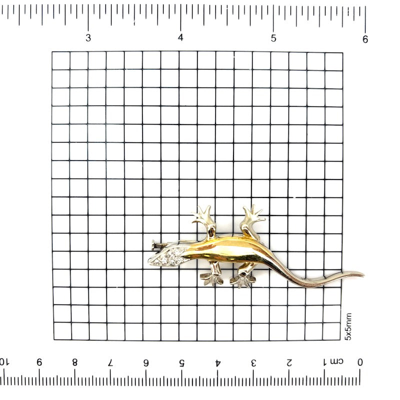 Spilla geko Pomellato, oro bicolore e brillanti; 14.45 gr